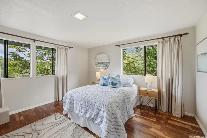 Second upstairs bedroom also includes beautiful engineered hardwood flooring and cool cross breezes.