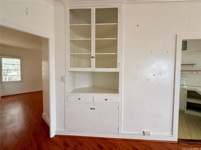 Convenient built-in storage space located off the kitchen.