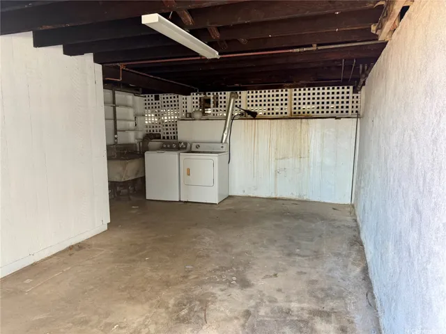 Convenient laundry area with ample room for additional storage.