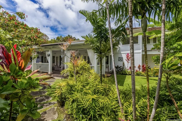 This enchanting property sits just one house back from Lanikai Beach.