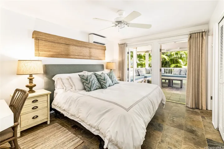 Bedroom 3 w/ensuite bath opens onto back covered lanai.