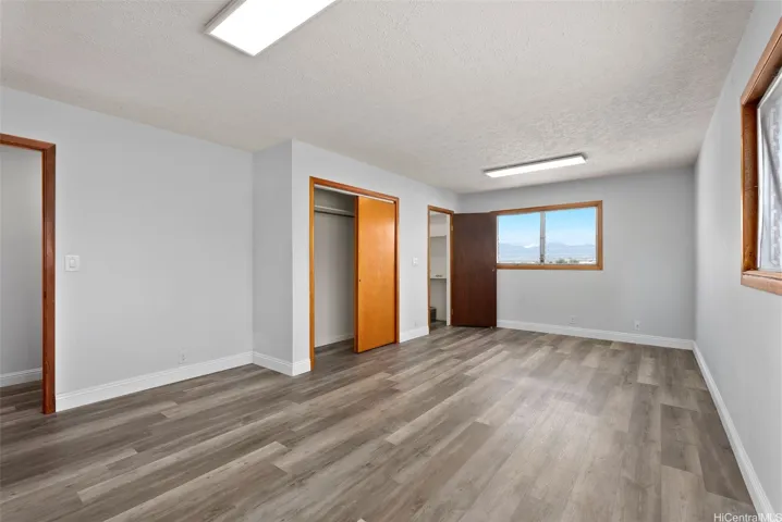 Bedroom 5 located above the Flex Room with sweeping mountain views and a peek-a-boo ocean view.