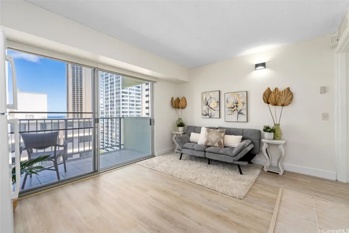 Large corner unit, with living area that includes peek-a-boo ocean views!