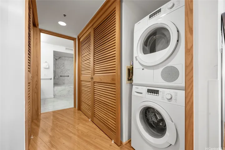 Bosch washer/dryer and 2 closets in the hallway.