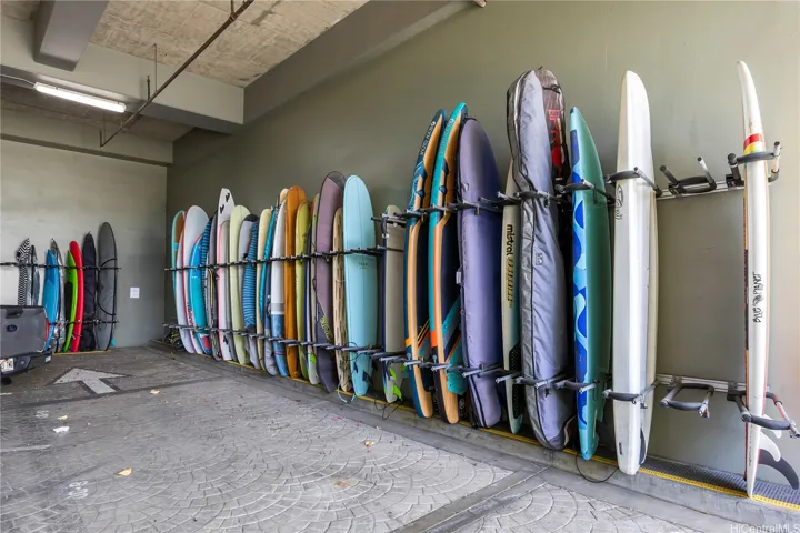 Surfboard rack in the far left corner of the roundabout.