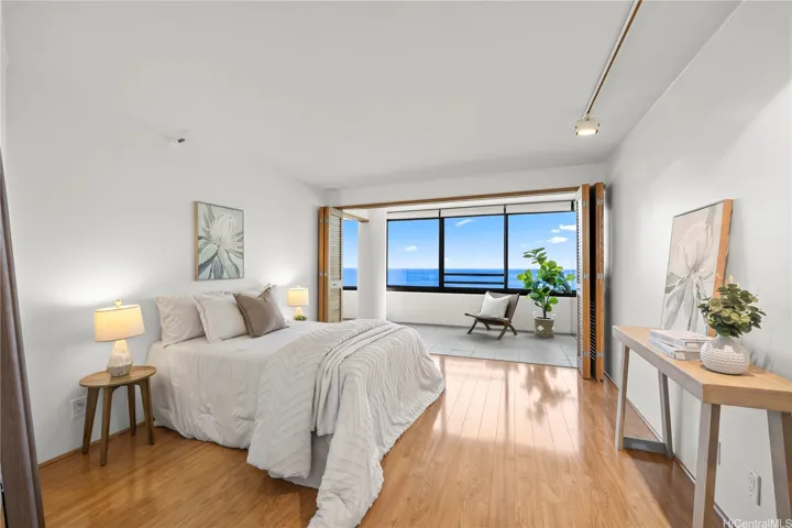 Bedroom has folding doors for privacy.