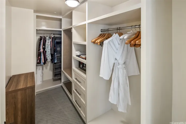 Primary walk-in closet.