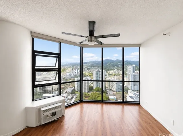 This unit is move in ready with fresh paint & new AC. Roller shades for privacy