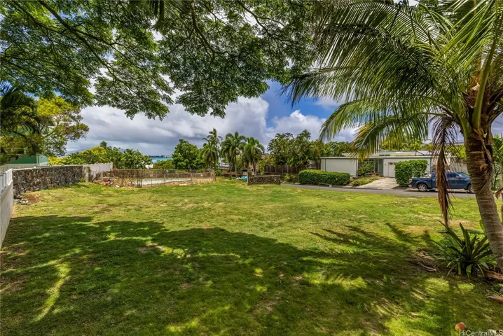 Large lot with pool ready for renovation. One property back from the water with direct Bay access.