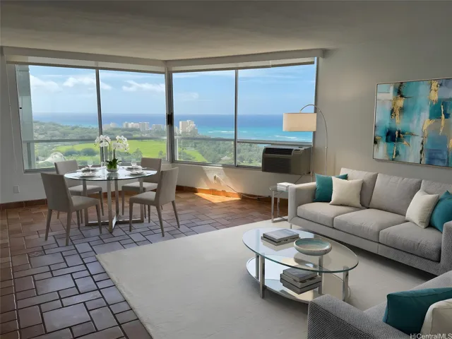 Enclosed Lanai added area to dine with views of the Ocean & Diamond Head .Large Living room.