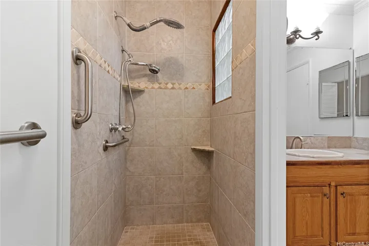 Stand up shower located in the Primary bedroom​​‌​​​​‌​​‌‌​‌‌​​​‌‌​‌​‌​‌​​​‌​​ en-suite.