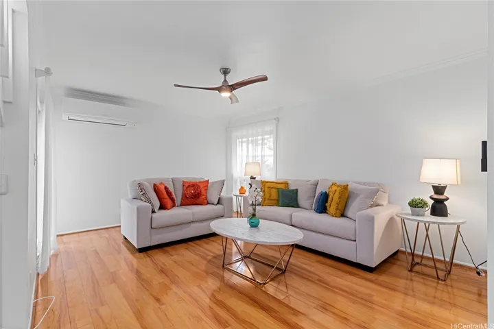 Walk into this split level townhome to see the spacious living room.