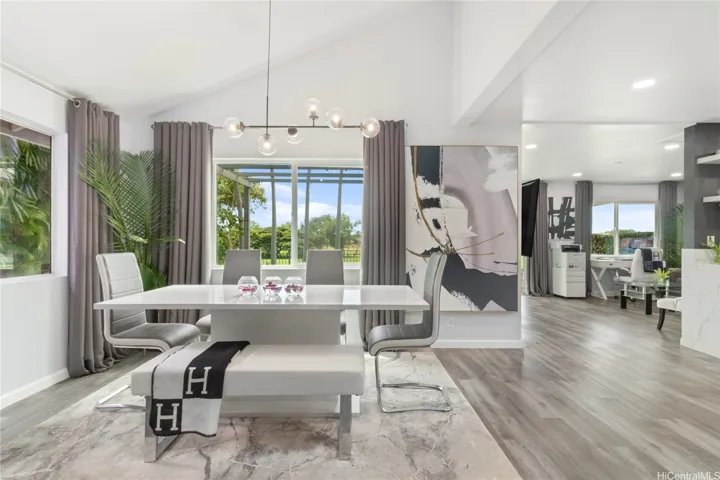 Dining area with picturesque views of the Coral Creek Golf Course.