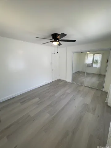 MASTER BEDROOM WITH CLOSET AND CEILING FAN
