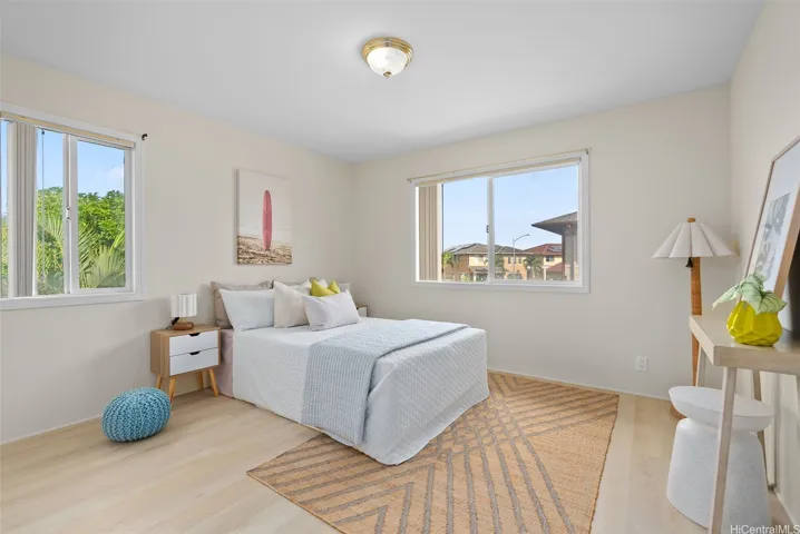 One of the home’s additional bedrooms, with space for a bed, desk and storage.