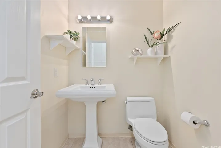 A half bathroom is conveniently located on the main level right by the garage door.