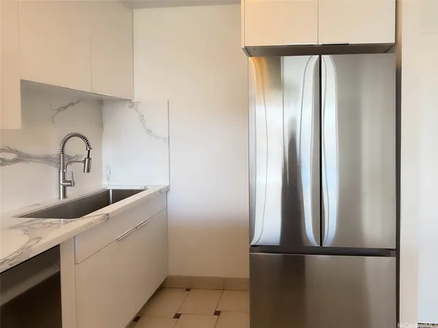 Completely renovated Kitchen with Acrylic Cabinets & top of the line stainless steel appliances