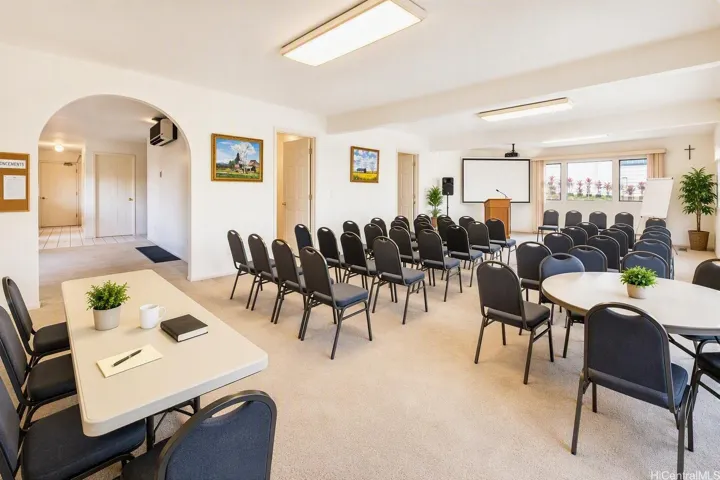 Downstairs - Spacious area for gatherings and group meeting with back side entrance. Virtually staged