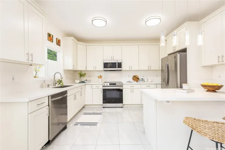 Stainless Steel Appliances + Wood Shaker Cabinets