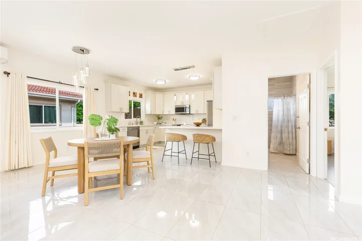 Dining, Kitchen, plus Full Bathroom & Bedroom 1 to the very Right.