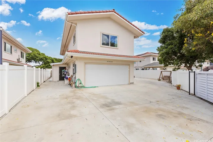 Front of the home! Fully-fenced. Gated, with room to park 7+ vehicles!