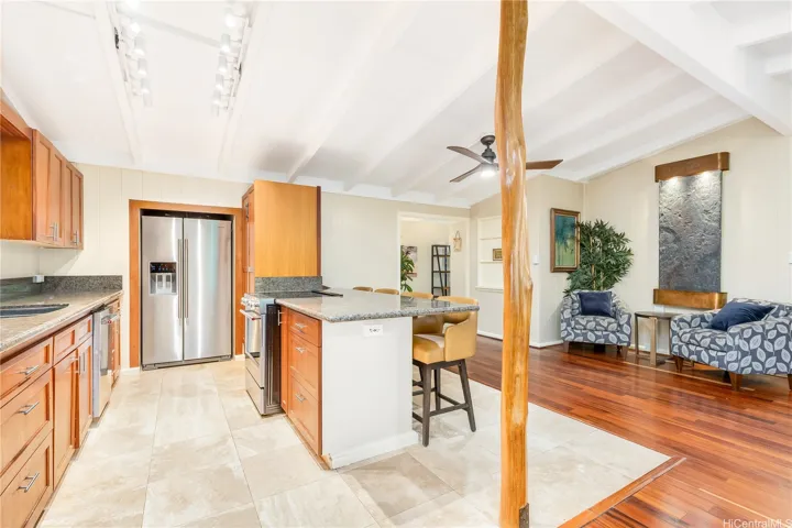 Spacious kitchen and bar space for dining.