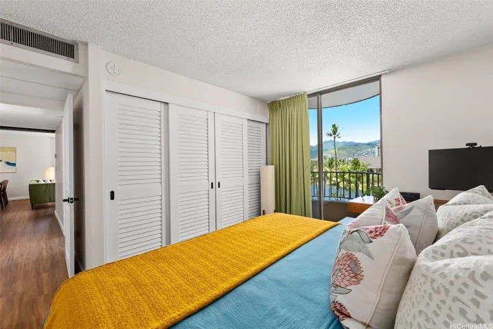 Primary bedroom features great closet space and beautiful open views