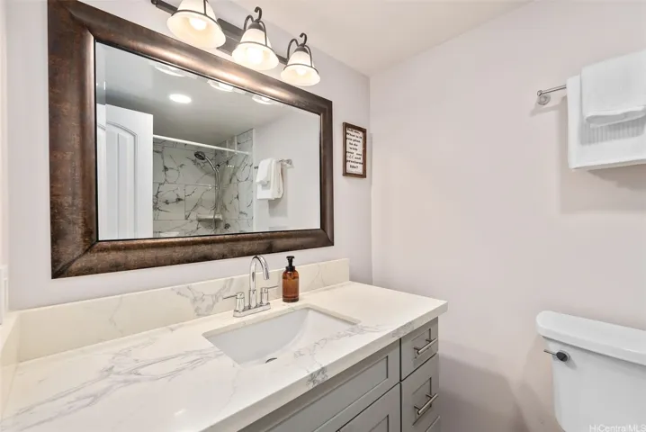 Primary bath has a walk-in shower.