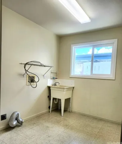 Laundry Room between the garage entry and kitchen