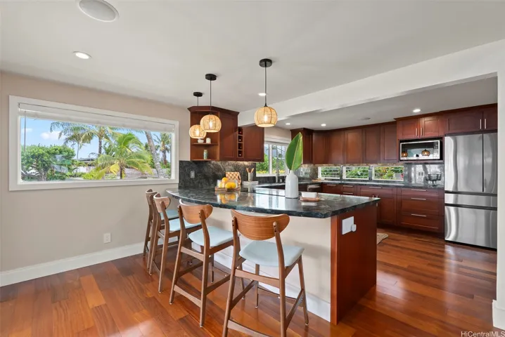 Kitchen with new light fixture and appliances