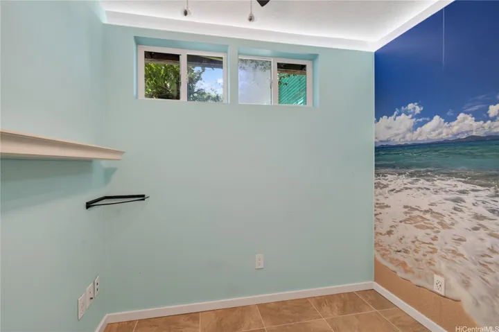 One of the many downstairs rooms, current owners enjoyed as office space.
