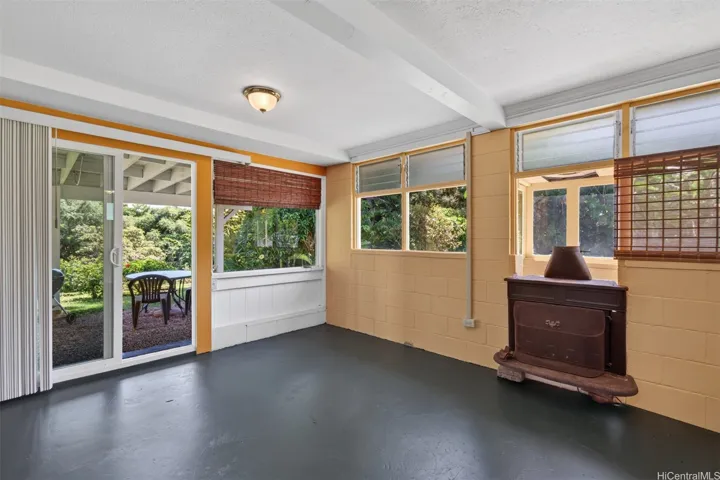 Downstairs living room flows to outdoors