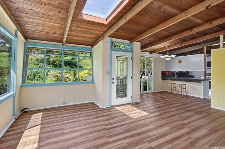 Open beam ceilings, skylights and windows provide for a light and bright home!
