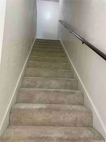 Stairs leading to upstairs bedrooms