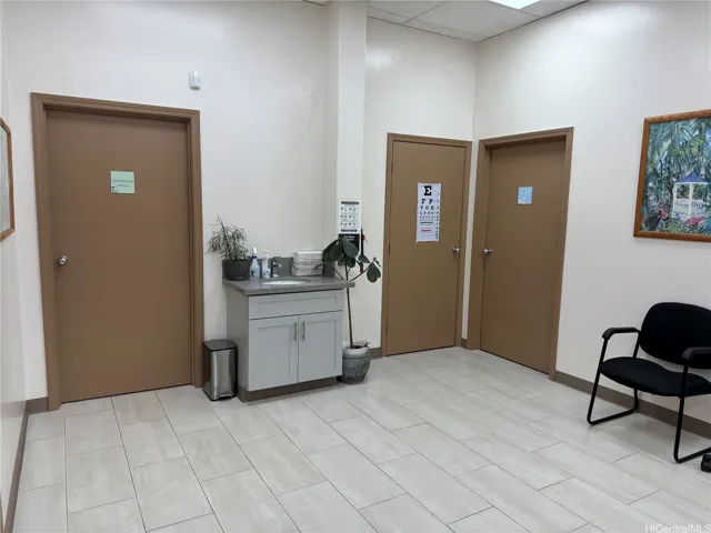 Second door to the right shows the entrance to the storage room