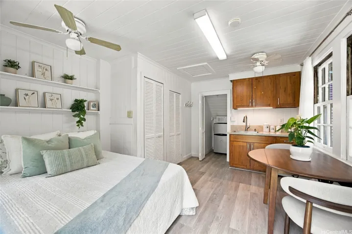 Cozy studio cottage has kitchenette and bath with shower.