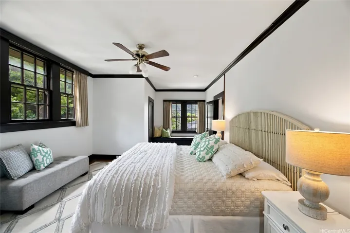 Large second bedroom has ample windows and two walk-in closets.