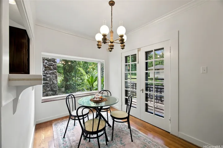 A charming breakfast nook off the kitchen also offers double doors to the patio.