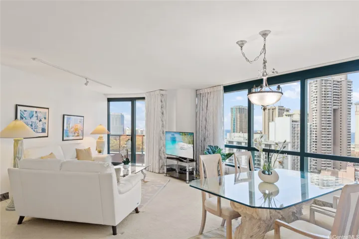 Living room with city and partial ocean views.