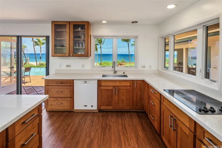 Open kitchen to entertaining and pool area.