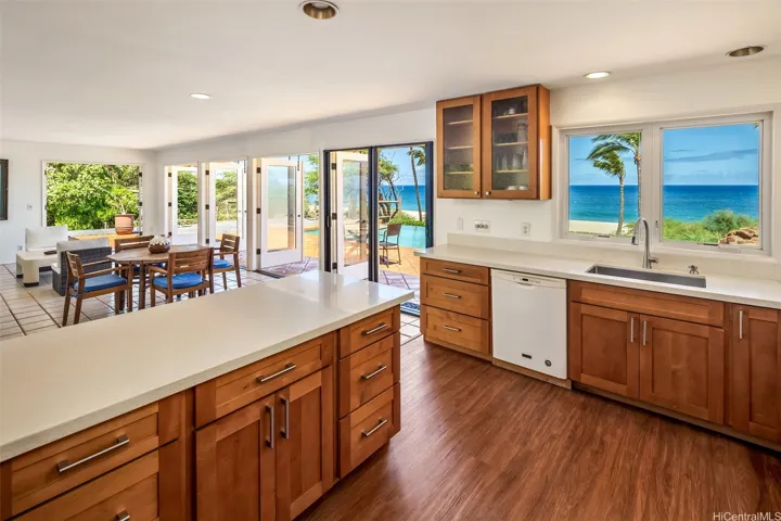 Modern kitchen with recessed lighting and  ocean views.