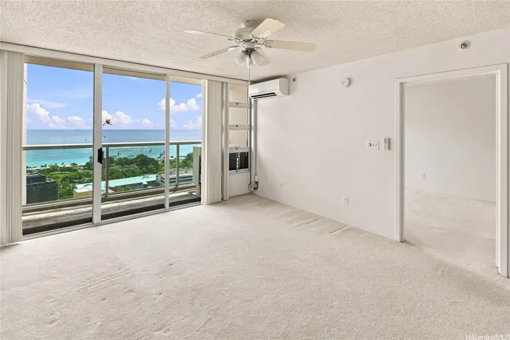 Living Room and lanai with door to bedroom