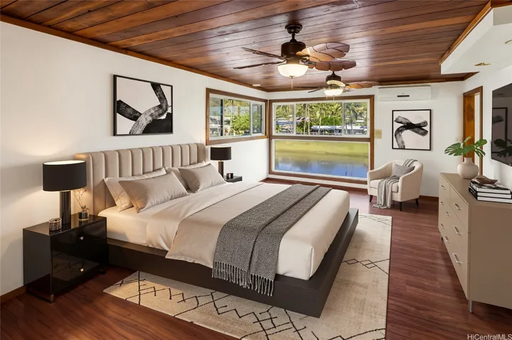 Enhanced. Primary Bedroom w/canal views