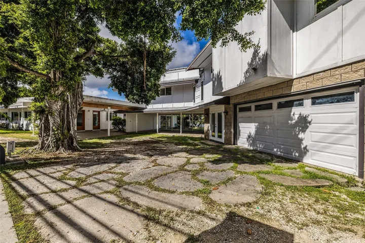 Driveway from N Kalaheo Ave shaded by the banyan tree