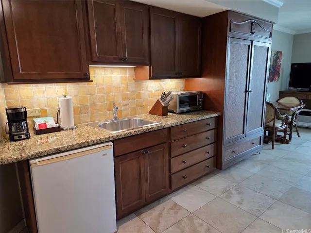 Nicely appointed kitchenette, Armoire, Dining Nook, Entertainment areas.