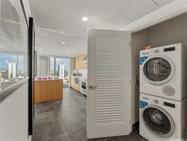 Bosch Washer and Dryer in unit for added convenience.