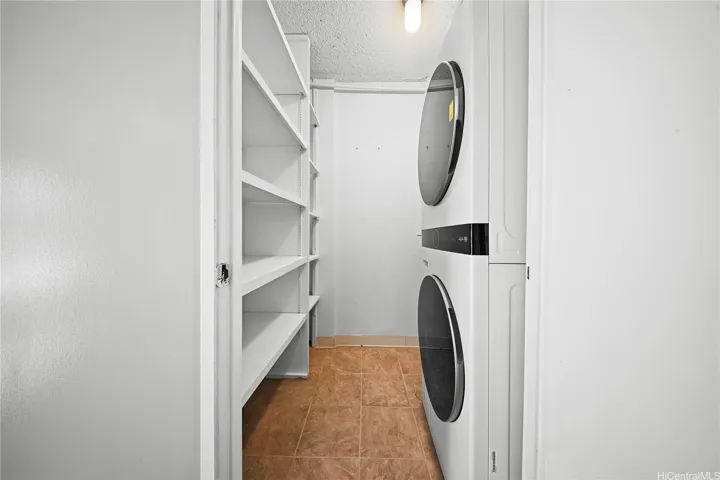 Landry room with stackable washer and dryer