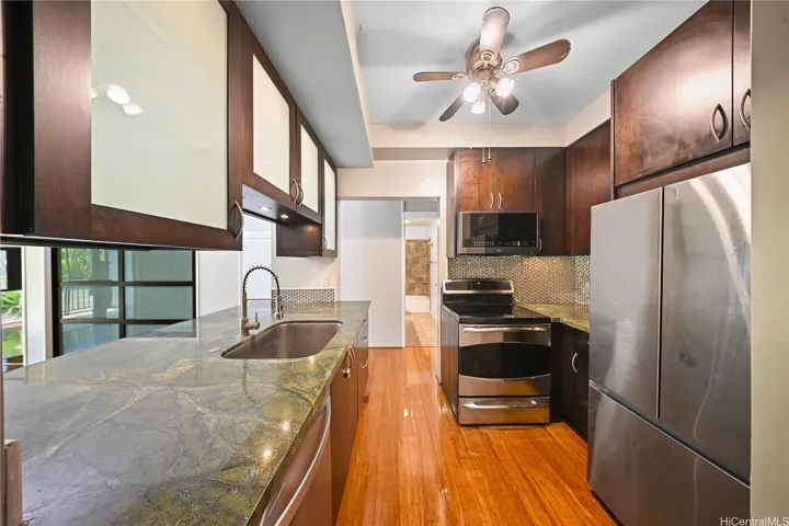 Step into the kitchen on your right.