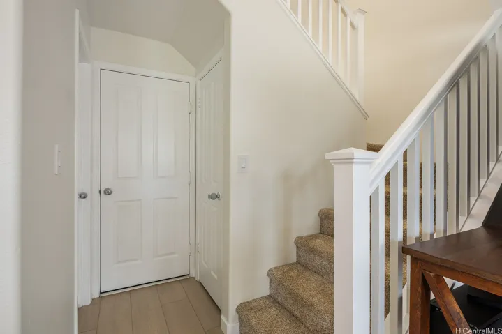 Door to the garage and door to the under the stairs storage