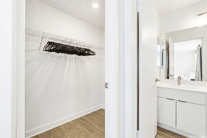 The spacious walk-in closet provides generous storage and organization, giving the primary suite the extra space you need to keep everything beautifully in its place.